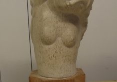 Female nude torso in stone